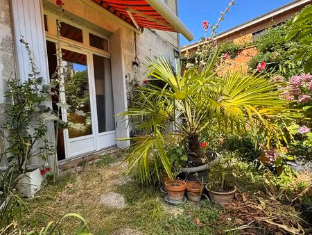maison de 130m2 en pierre t6 avec garage parc rivière barrière du médoc