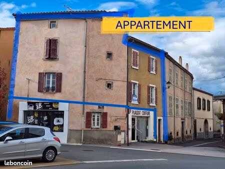 appartement dans immeuble commercial