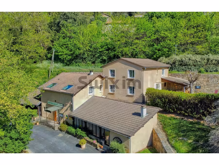 maison individuelle avec local commercial