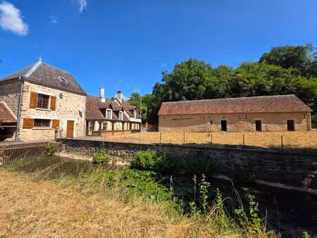 ancien moulin de 253m2 avec son brief en eau et 2ha49a79ca de terrain