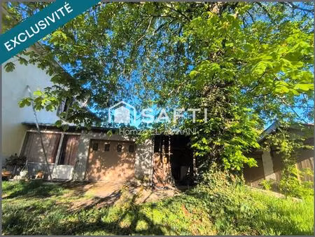 grande maison avec garages dépendances jardin idéalement située