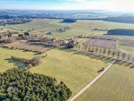 terrain de 20 ares à houffalize + 2ha en agricole possible