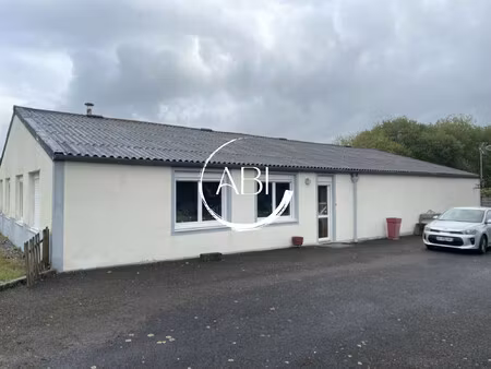 local de 290 m² (garage de 150 m² et logement de 120 m²)