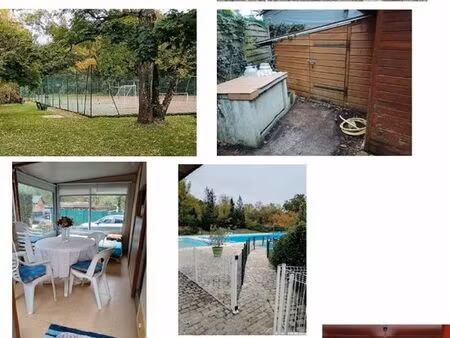 terrain avec caravane et petit chalet