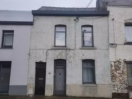 maison 2 façades avec jardin et garage