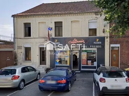 immeuble comprenant un café tabac et un logement