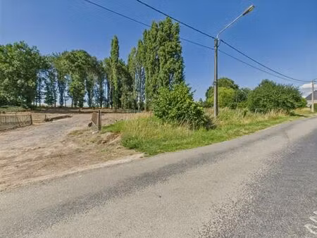 terrain à bâtir de +/- 1.126 m² – en pleine campagne  proche