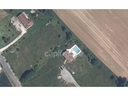 terrain 3 878 m² – cadre naturel privilégié à moulînet