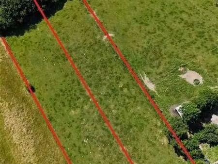 beau terrain de +/- 26 ares