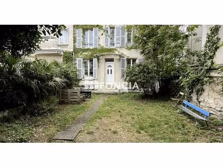 maison avec jardin au centre ville