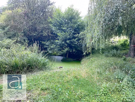 broons ? terrain de loisirs de 6 342 m² en bord de ruisseau  dépendances et bâtis