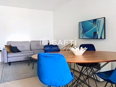 t2  moderne balcon  parking  proche rer / commerces