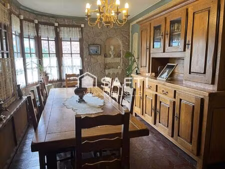 jardin arboré sans vis à vis  au fort potentiel et grand garage