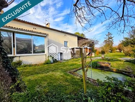 maison en pierre autonome en énergie !! garage  dépendances  jardin ! parcelle constructib