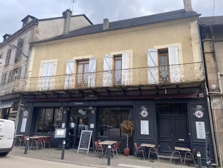 immeuble avec fonds de commerce + 2 appartements