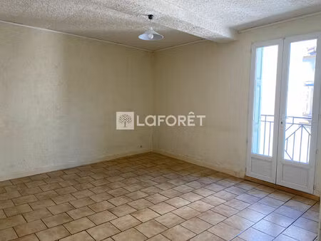 immeuble avec commerce et duplex.