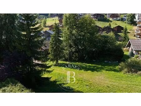 les gets – terrain constructible de 595 m² – emplacement central idéal