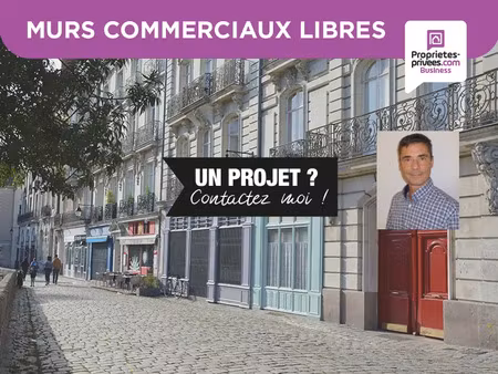 houdan centre- murs commerciaux 90 m² possibilité passage en habitation