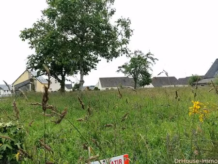 ref 75842- parcelle de terre à bâtir d'une superficie de 1200 m2 env