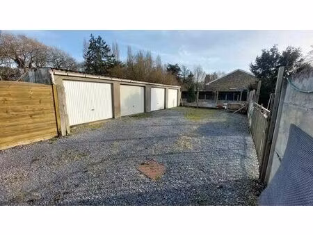4 garages sur 256 m² de terrain proche centre ville mons.