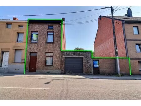 maison avec garage  jardin et possibilité de deux logements