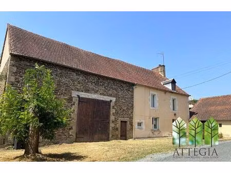 une maison 4 chambres  une grange et du terrain. beaucoup de cha