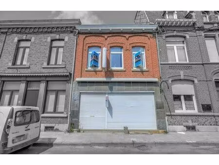 maison de commerce a renover 3-4ch avec garage et terrasse