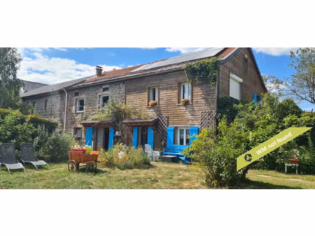 ensemble immobilier en pierre avec gîtes et habitation princ