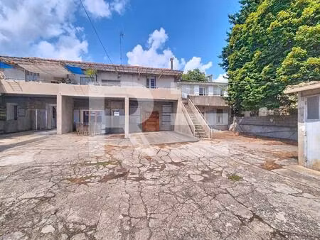 ensemble immobilier - 7 appartements 8 garages – idéal investisseur