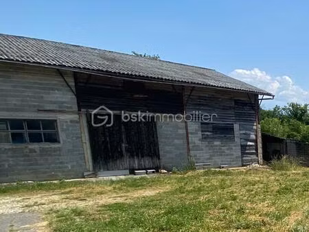 corps de ferme de 400 m² à versonnex