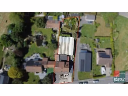 *option*immeuble composé d'un commerce et d'un appartement