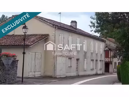 maison a renover avec 2 garages