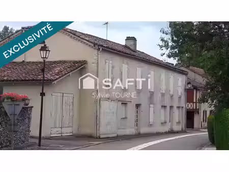 maison a renover avec 2 garages