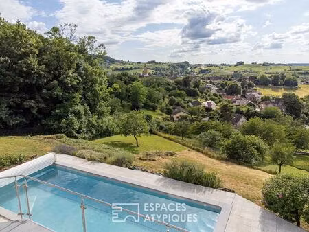 maison avec sa piscine et sa vue imprenable
