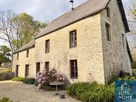 maison ancienne avec ses trois gîtes  à colleville-sur-mer