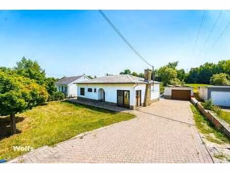 charmant bungalow avec garage et jardin !