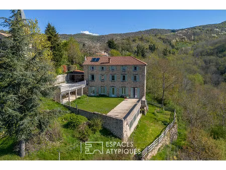 en ardèche  école réhabilitée en maison de famille avec vue panoramique.