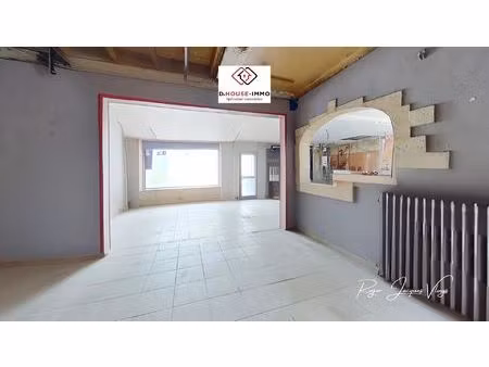 56560 guiscriff – immeuble de 237 m² utiles (153 m² d’habitation + 84 m² de locaux commerc