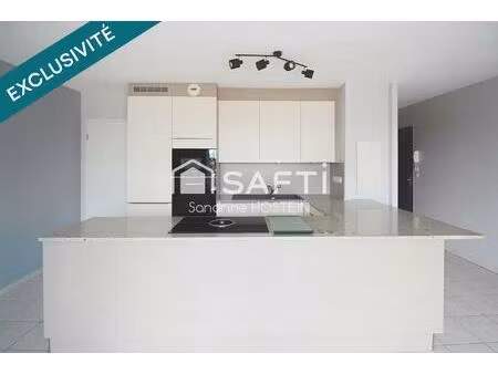 joli appartement de 70m2 avec terrasse  cave et places de stationnements