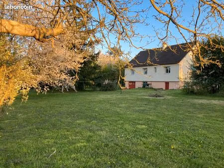 maison traditionnelle sur s/sol total et 1940 m2 de terrain