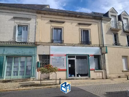 immeuble avec appartements et commerce