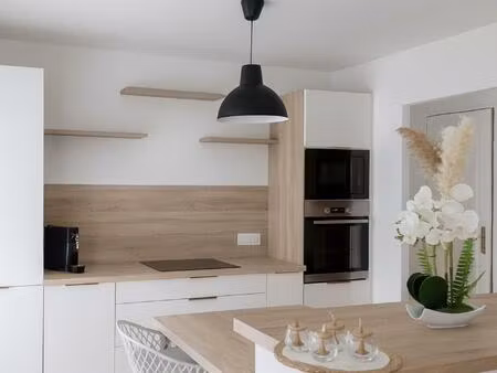 spacieuse maison de 141 m² avec 4 chambres  cuisine neuve  véranda lumineuse et jardin clo