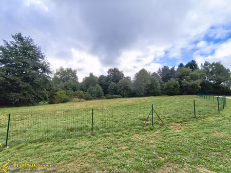 à saint-rémy-sur-durolle proche du plan d'eau  terrain de 21