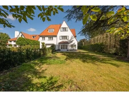 gerenoveerde  ongemeubelde koppelvilla met zuidgerichte tuin palend aan de golf - zoute