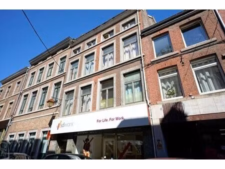 immeuble de 3 appts. + 1 commerce - en ordre