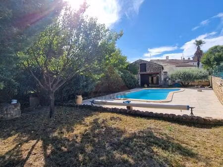 maison en pierres avec hangar et piscine
