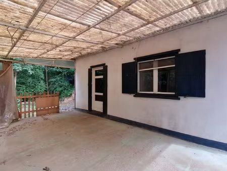 maison à rénover dans cadre naturel avec rivière curvalle