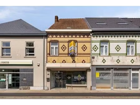 maison de commerce  centre de dworp sur 2a51ca  à rénover