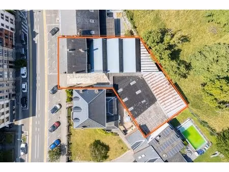 immeuble avec entrepôt et surface commerciale – virton