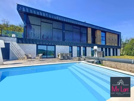 maison de luxe à vendre à berg-sur-moselle